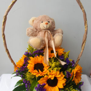 Canasta de girasoles con peluche